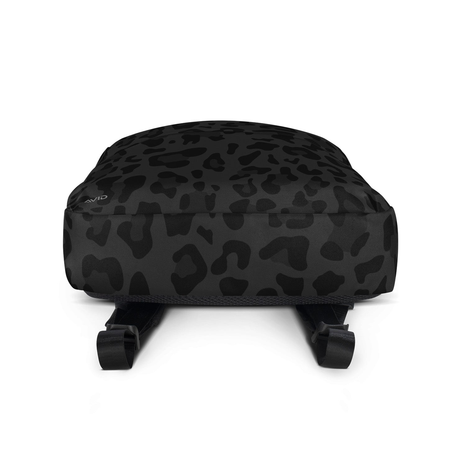 Black leopard print ottoman on a white background