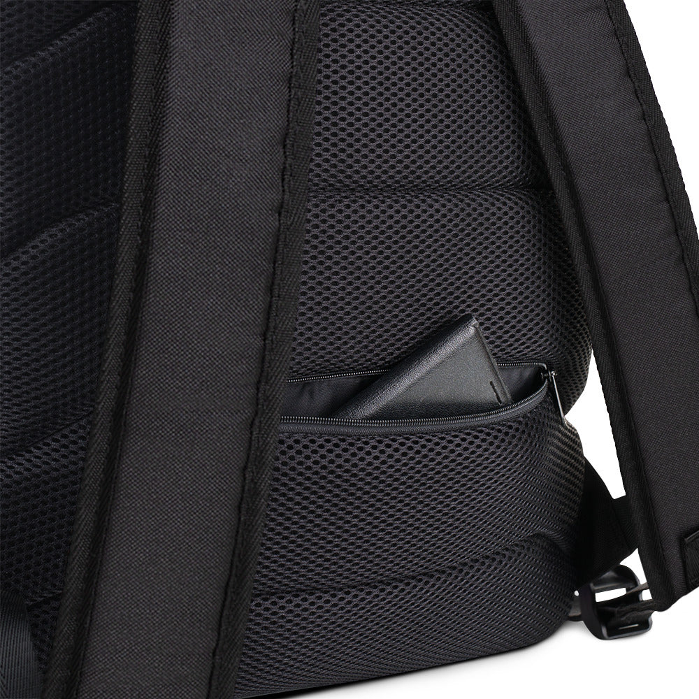 Close-up of a black backpack's mesh pocket with a mobile phone inside, showcasing the backpack's water-resistant material and mesh backing.