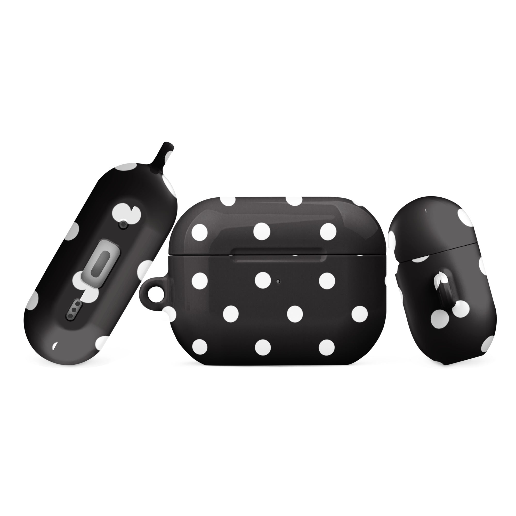 A black and white polka dot case for AirPods with a metal carabiner attachment.