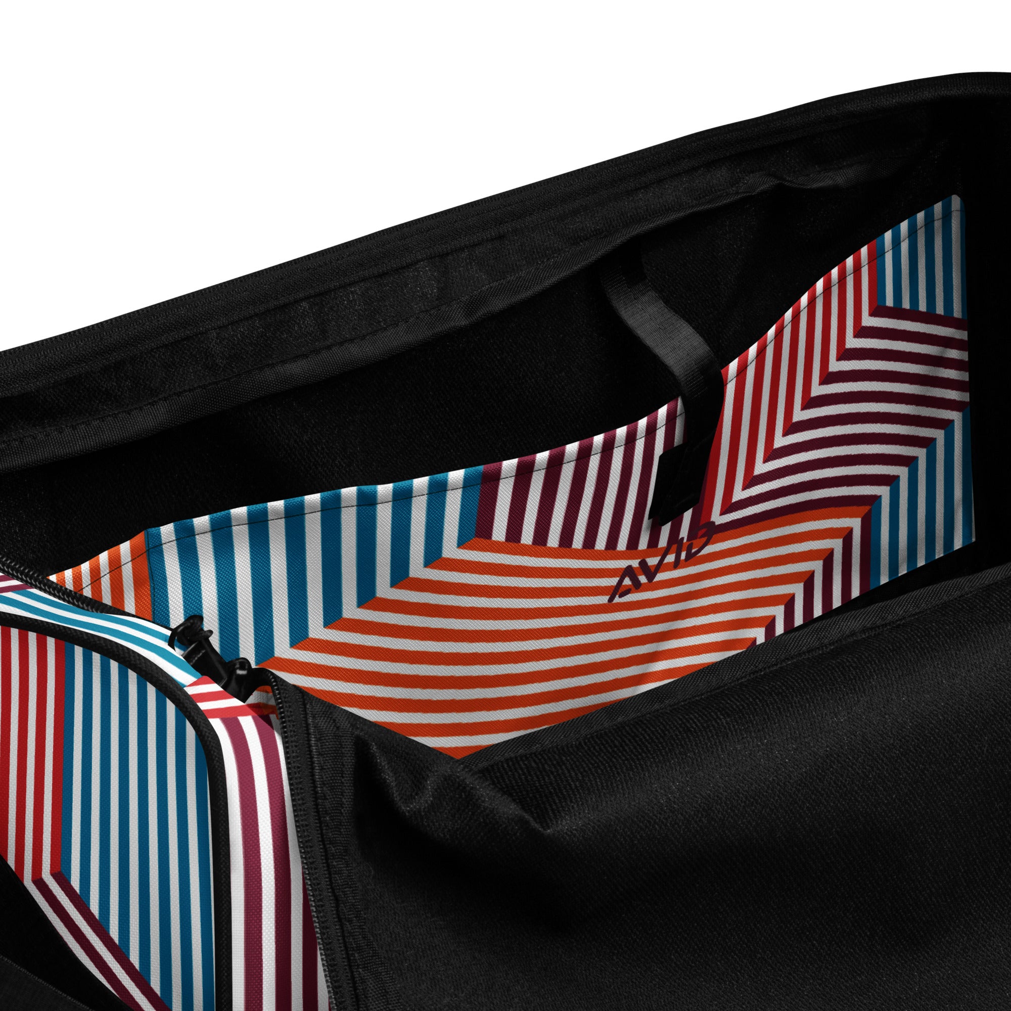 Colorful geometric patterned duffel bag with black straps on a white background