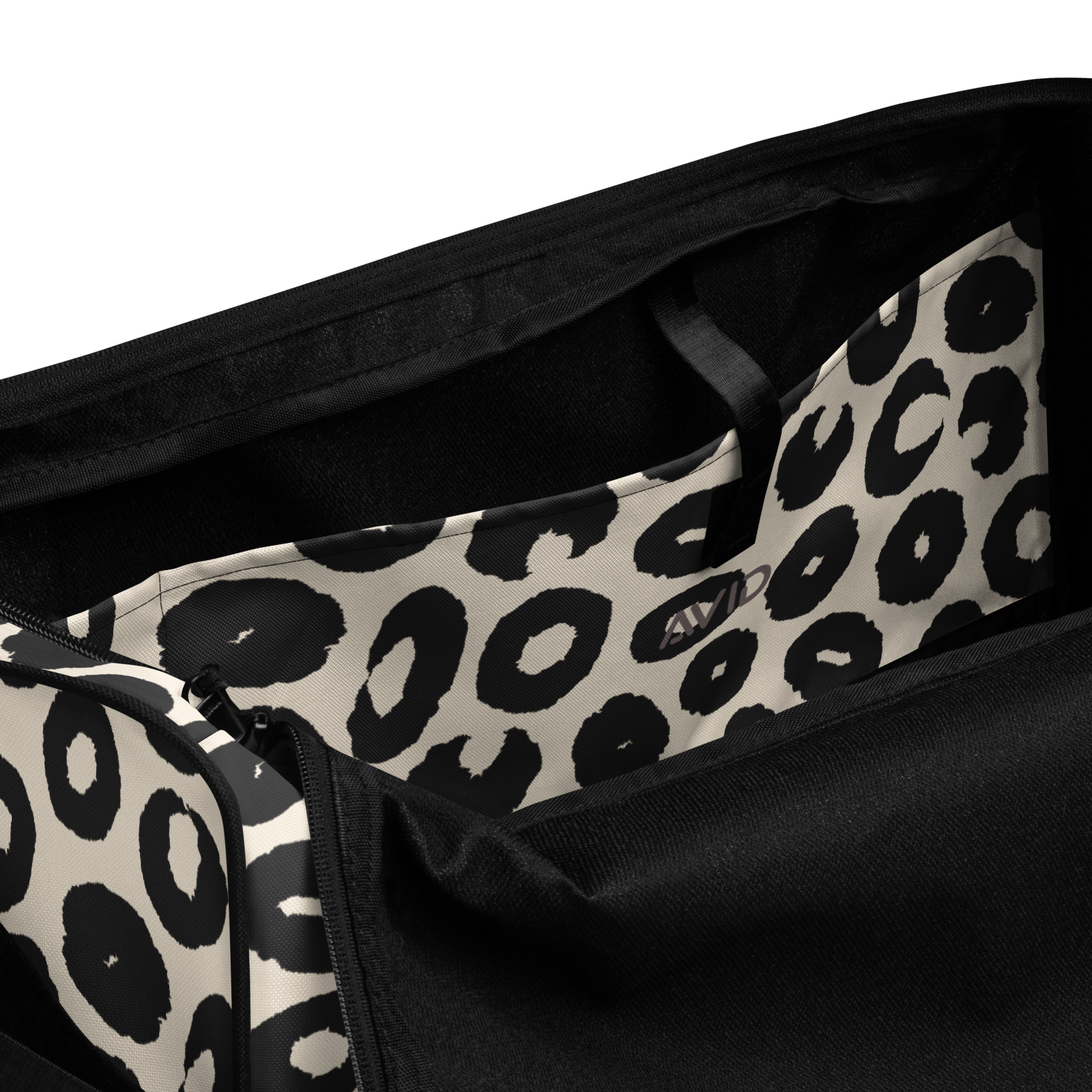 Leopard print duffel bag with black straps on a white background