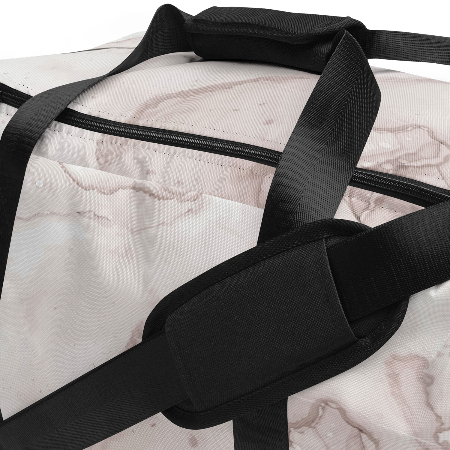 Close-up of a duffel bag with black straps on a marble surface