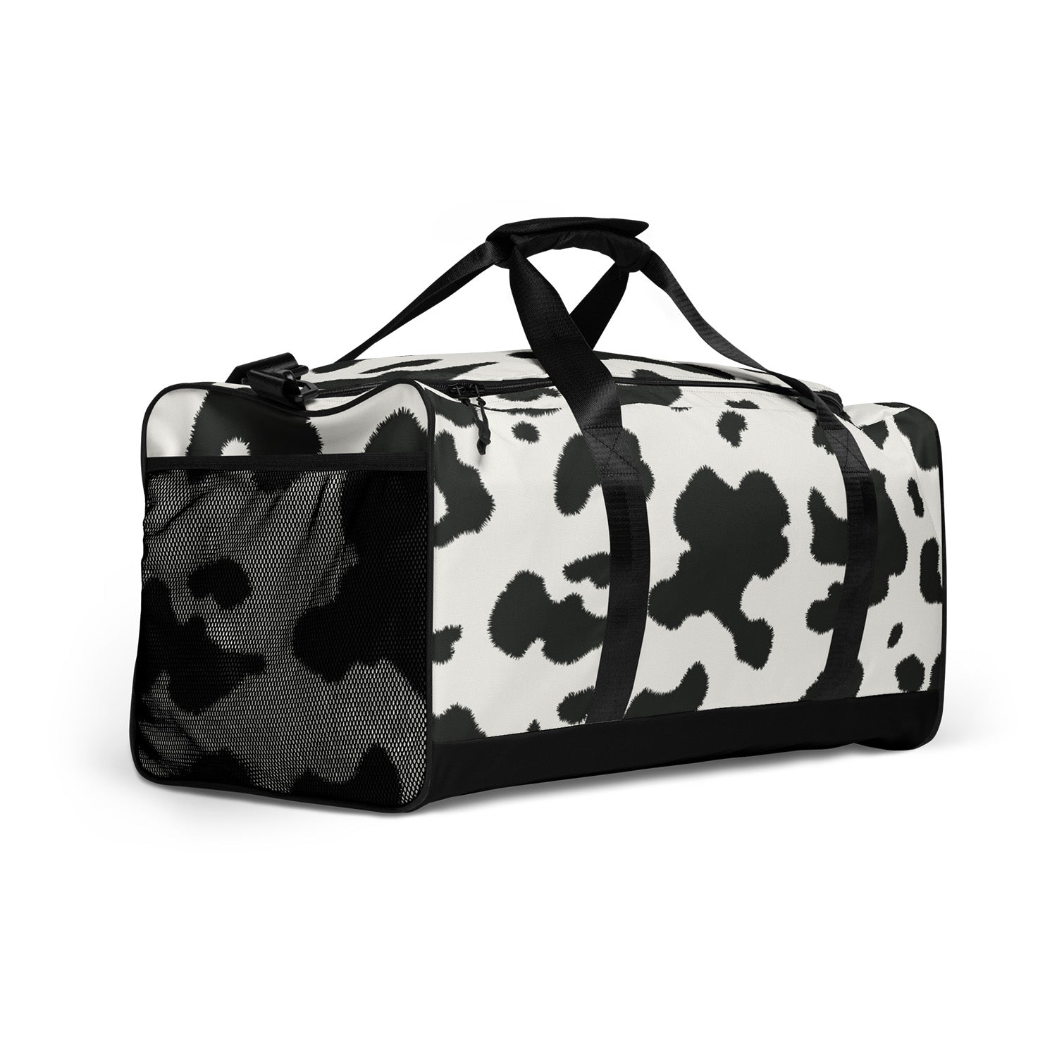 Duffle bag with black and white cow print pattern on a white background