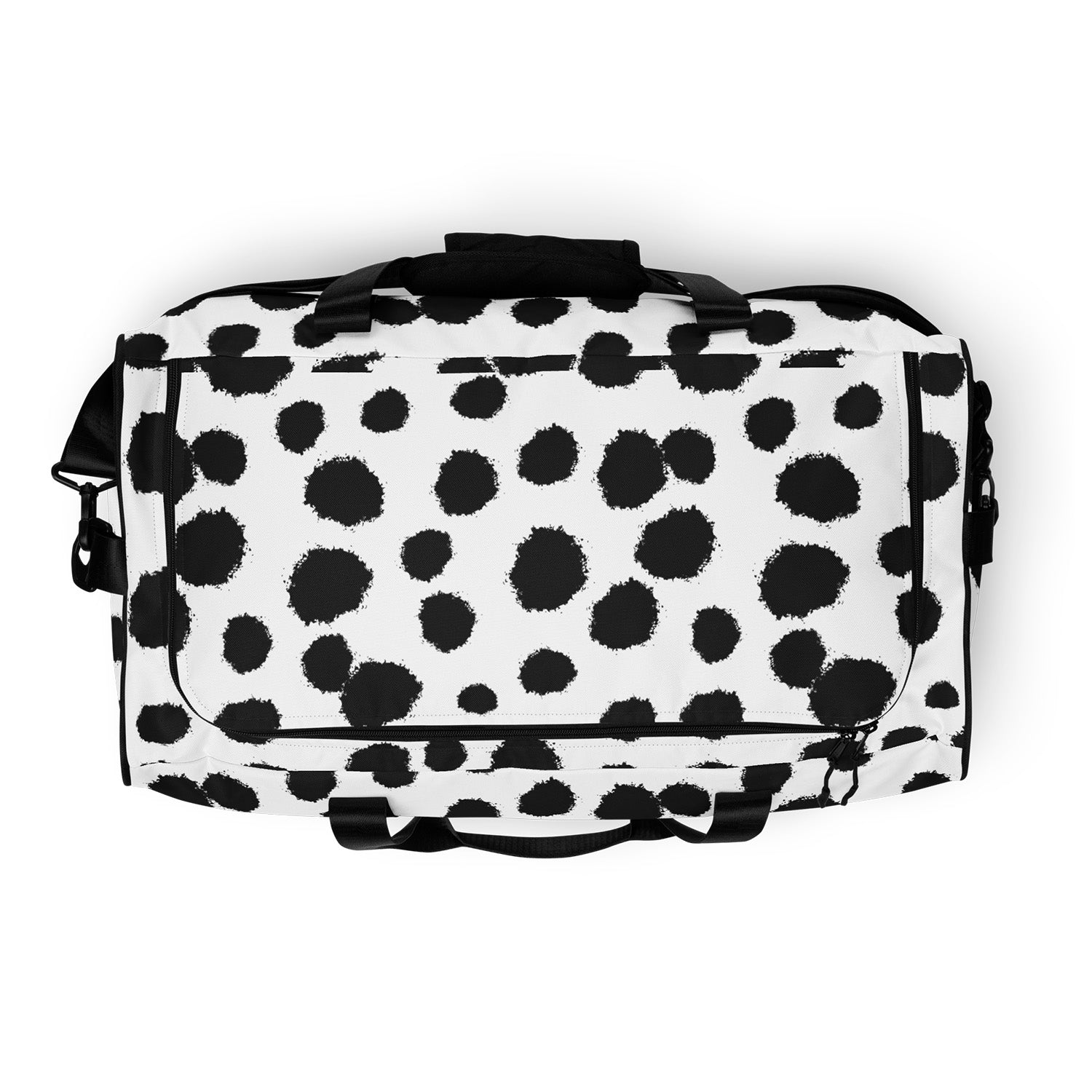 Duffle bag with black polka dot pattern on a white background