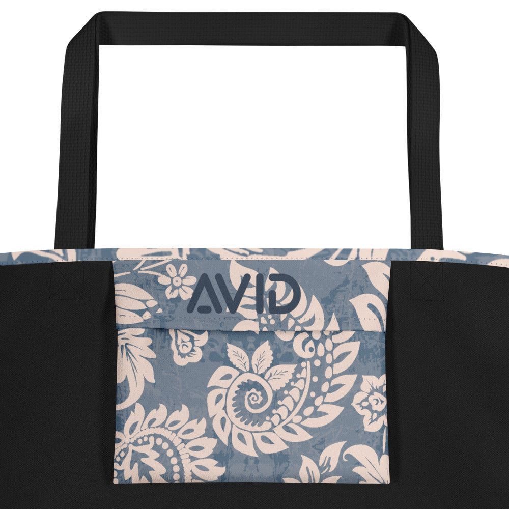 A large tote bag with a Yogi pattern in shades of blue and white. Inside pocket detail