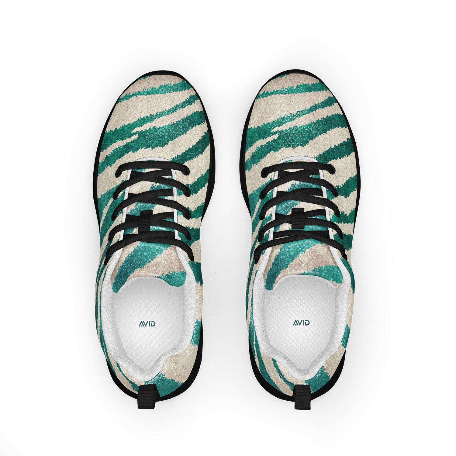 Pair of green and beige patterned sneakers on a white background
