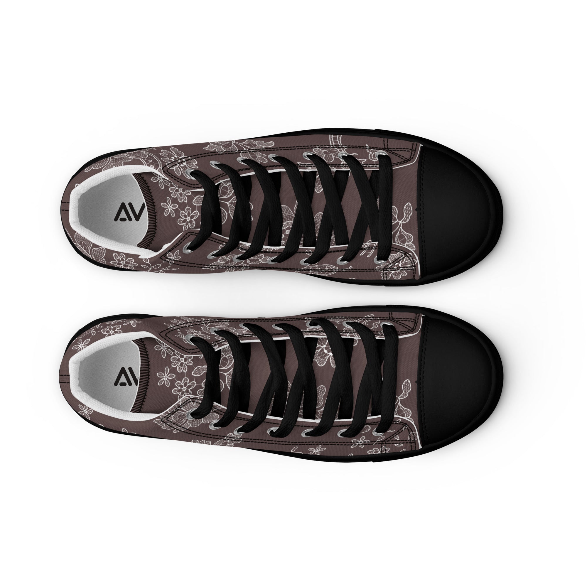 Pair of sneakers with floral pattern and black laces on a white background