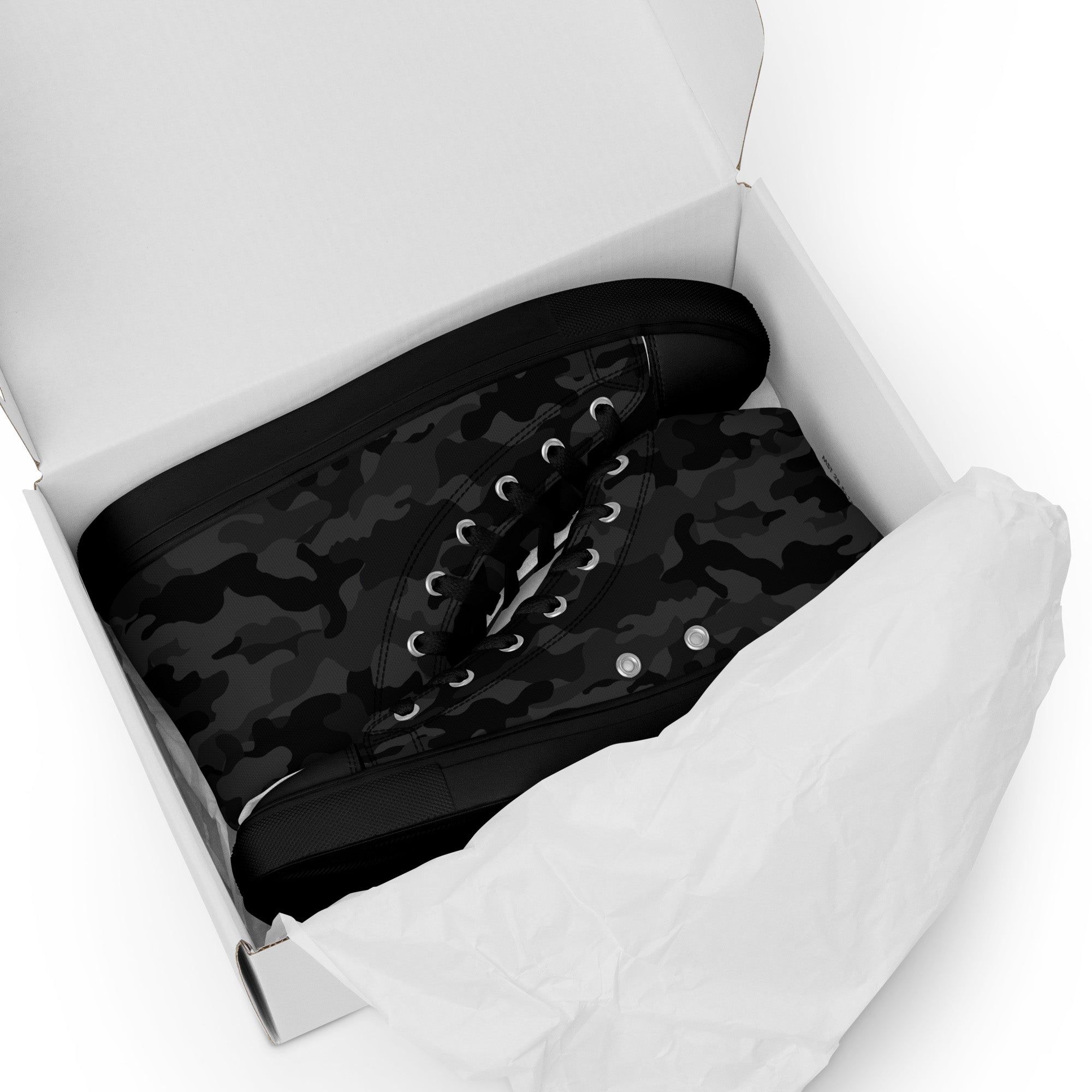 Black camouflage sneakers in a white shoe box on a white background