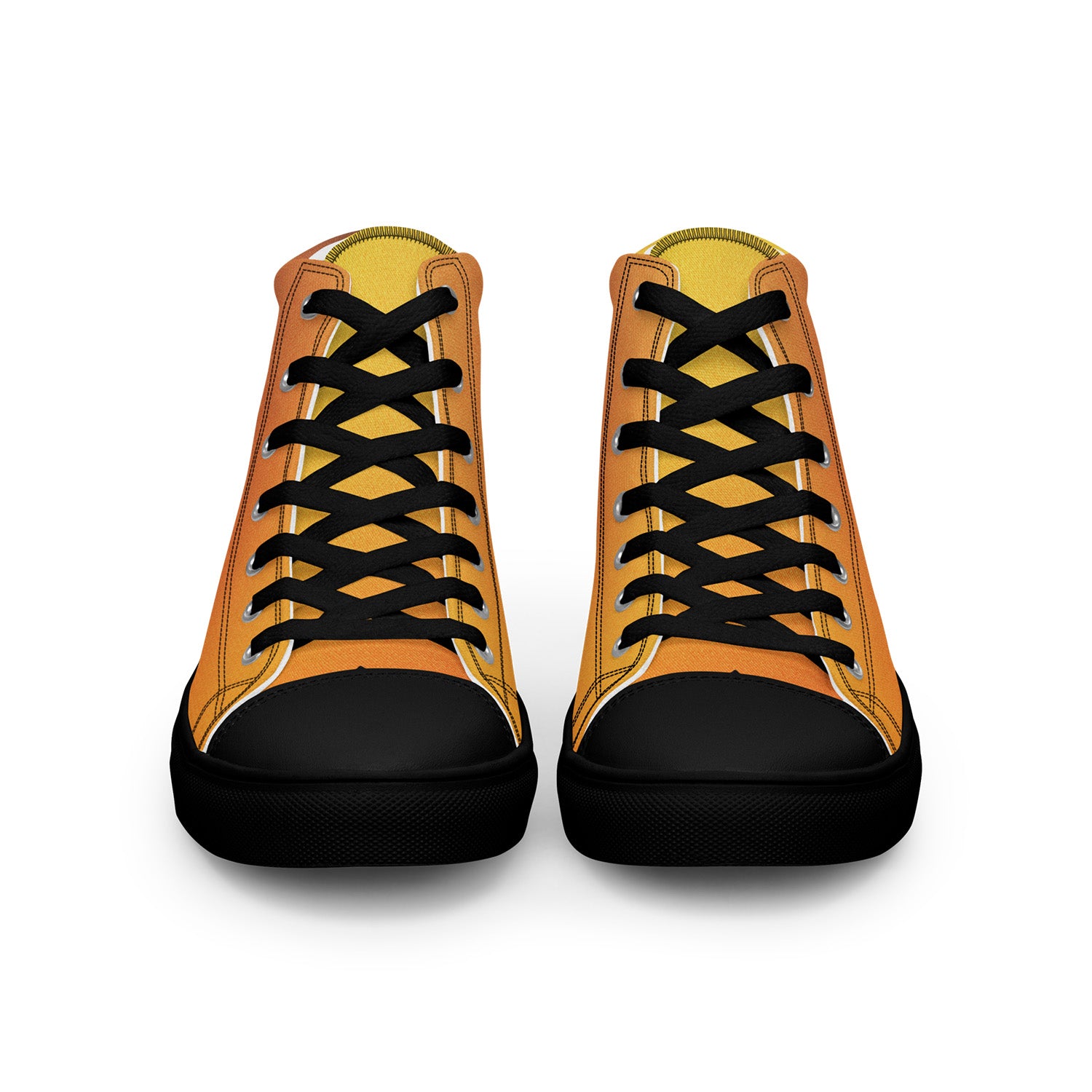 Pair of orange sneakers with black laces and soles on a white background
