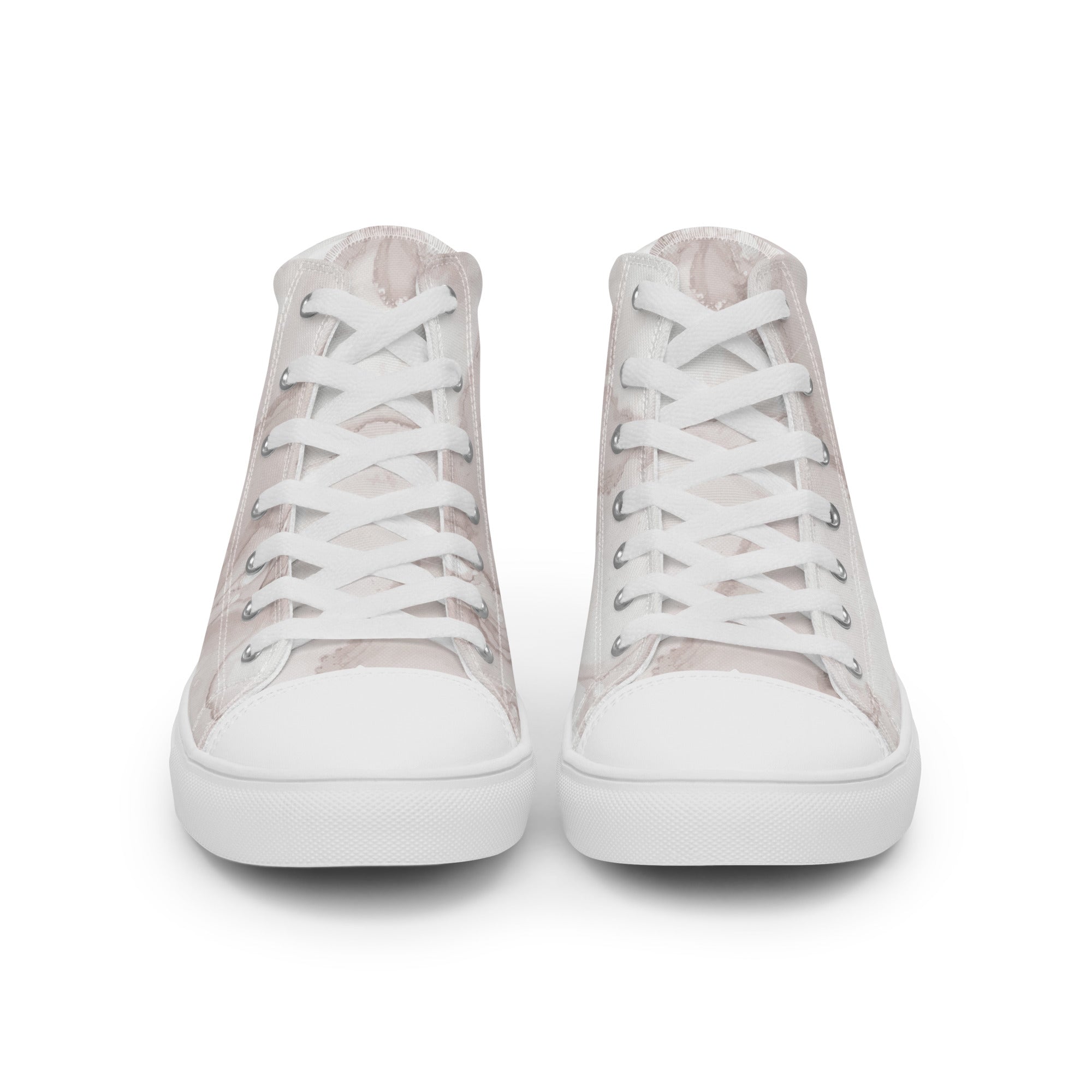 Pair of white high-top sneakers on a white background