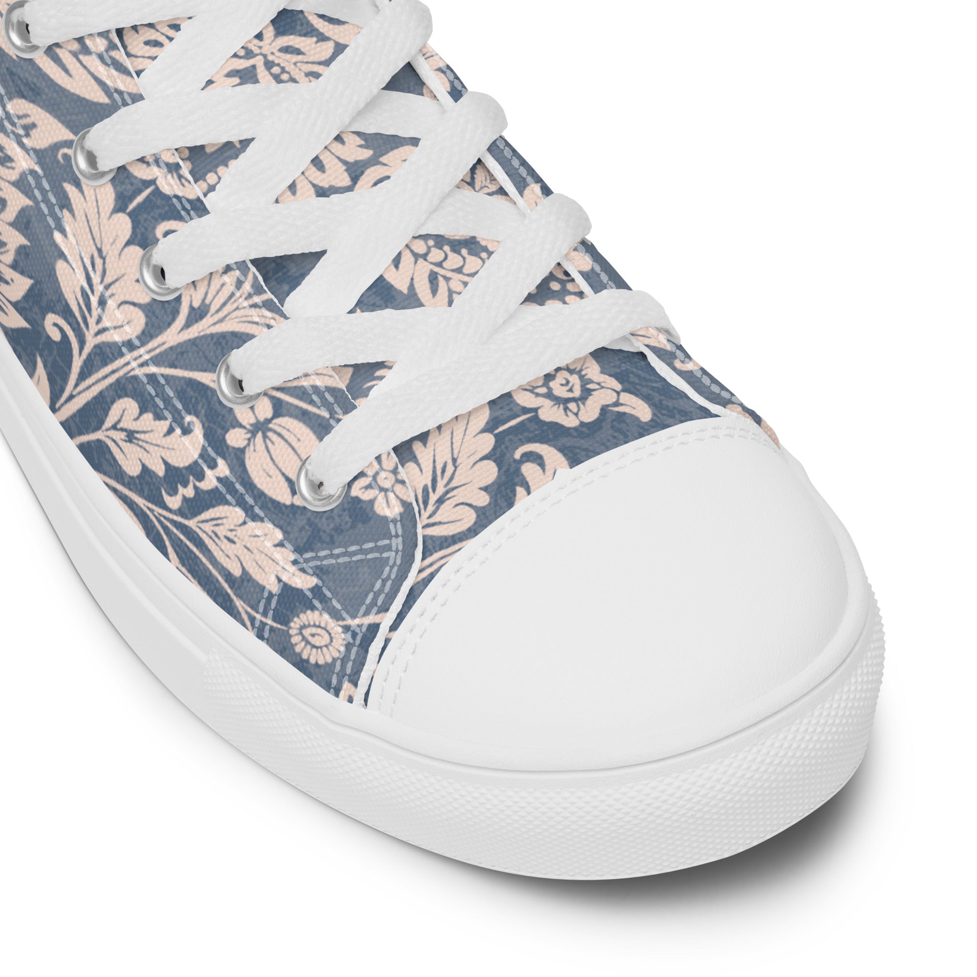 Sneaker with floral pattern on a white background