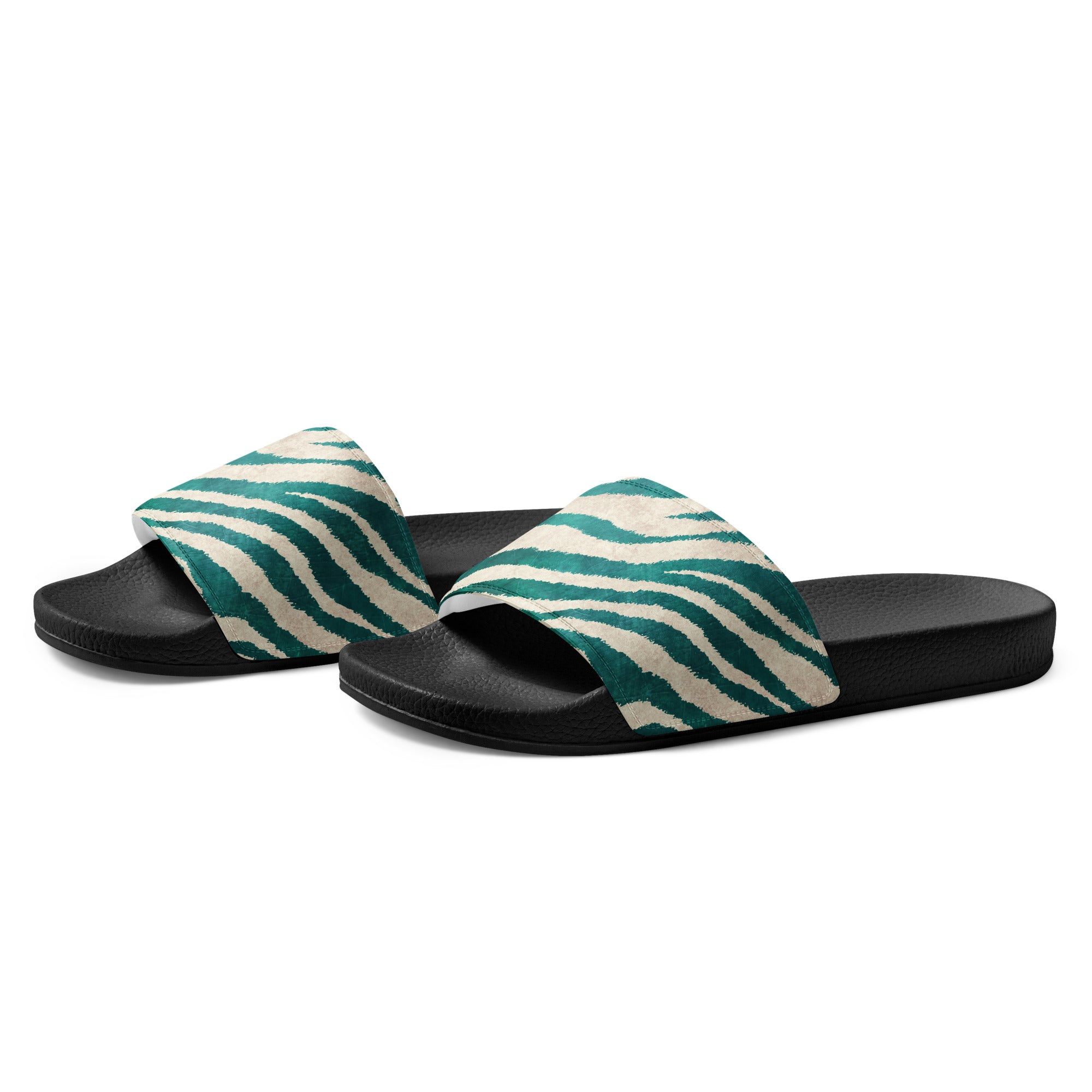 Pair of green zebra-patterned slides with black soles