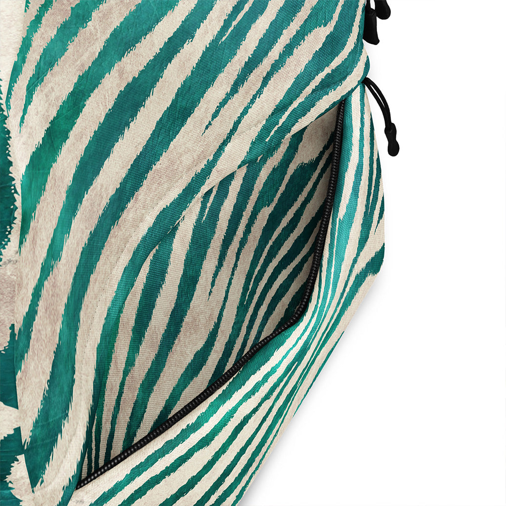 Close-up of a green and beige striped bag with a white background