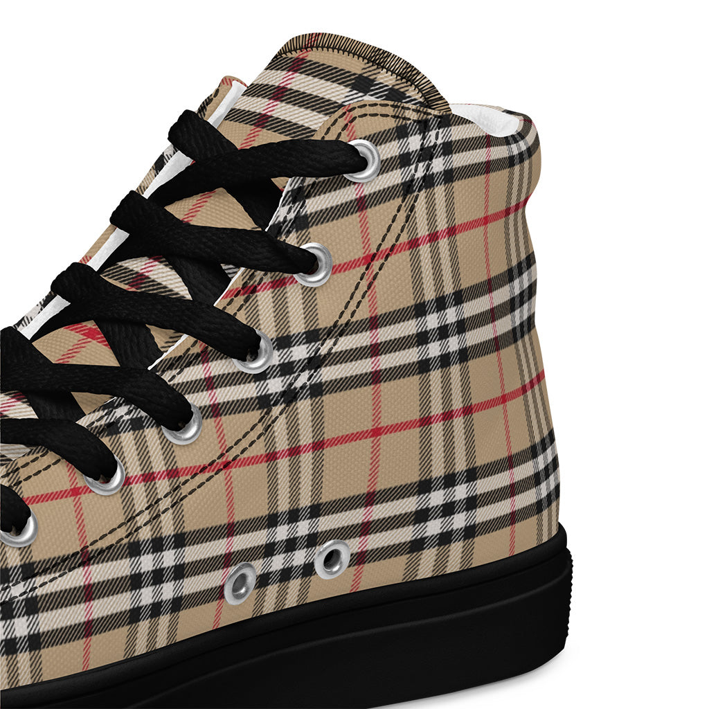 Plaid patterned sneaker with black laces on a white background