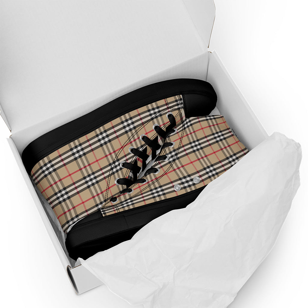 hightop canvas shoes with plaid pattern and black design in a white box