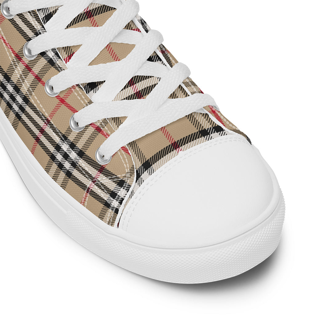 Plaid sneaker with white laces on a white background