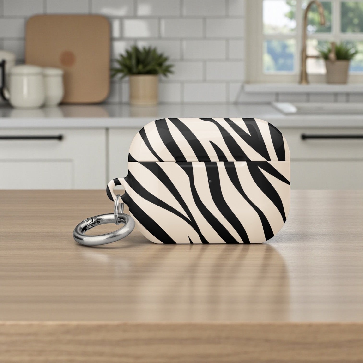 Zebra patterned case on a kitchen counter