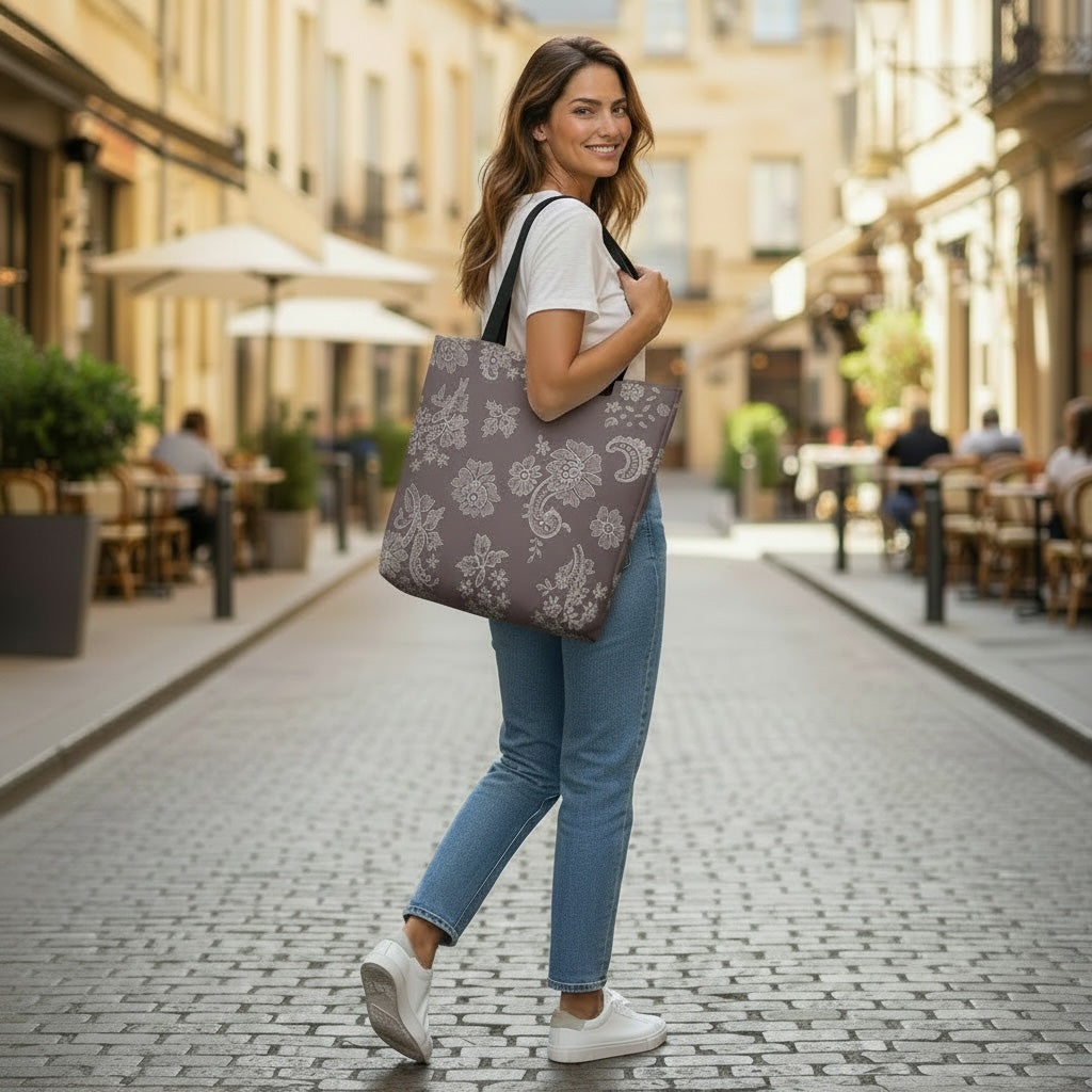 Woman walking down a street with an Auburn tote bag