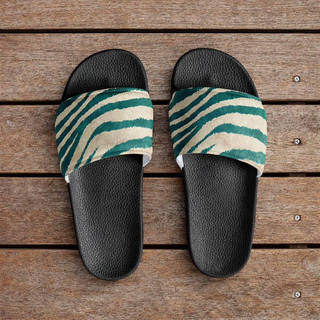 Pair of green zebra-patterned slides