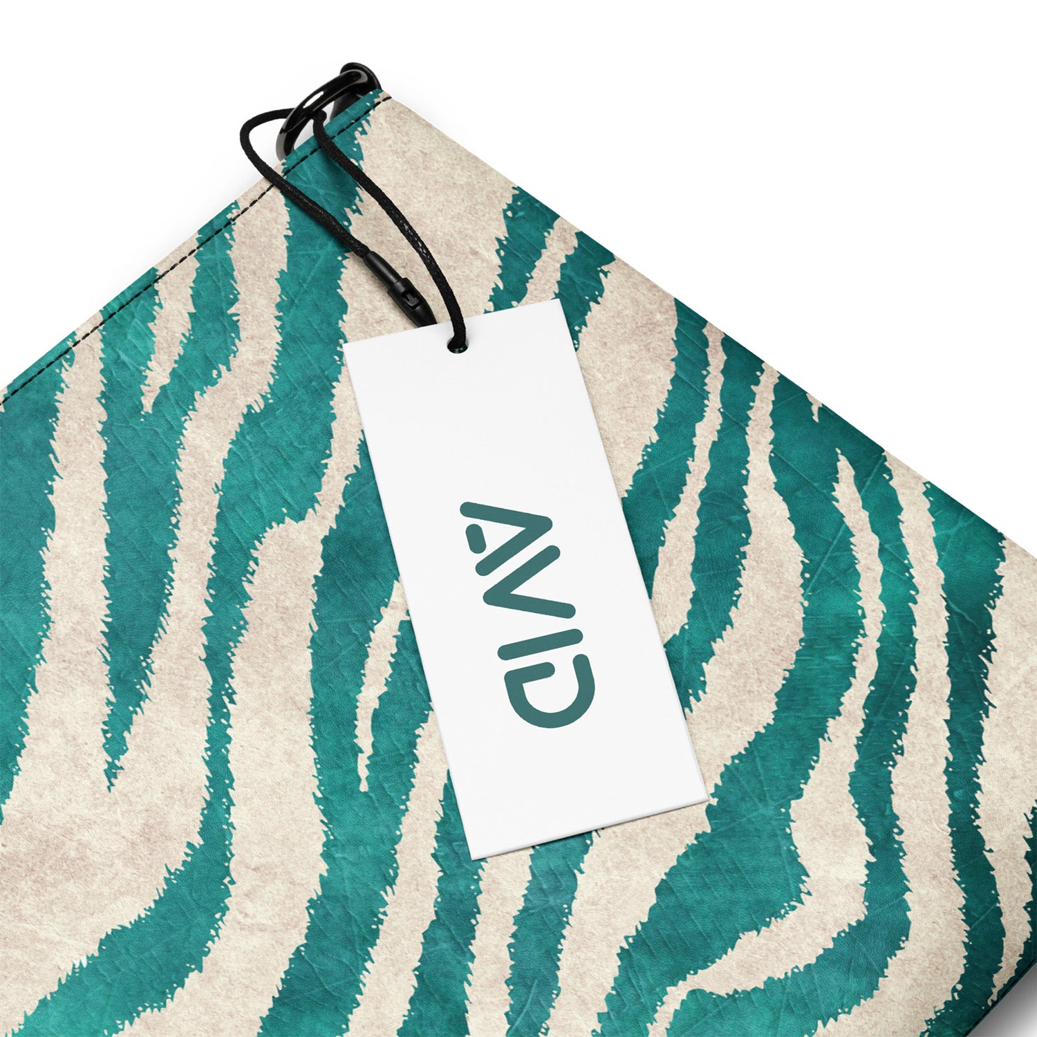 Teal and beige patterned product with a white tag displaying 'AVID' on a white background