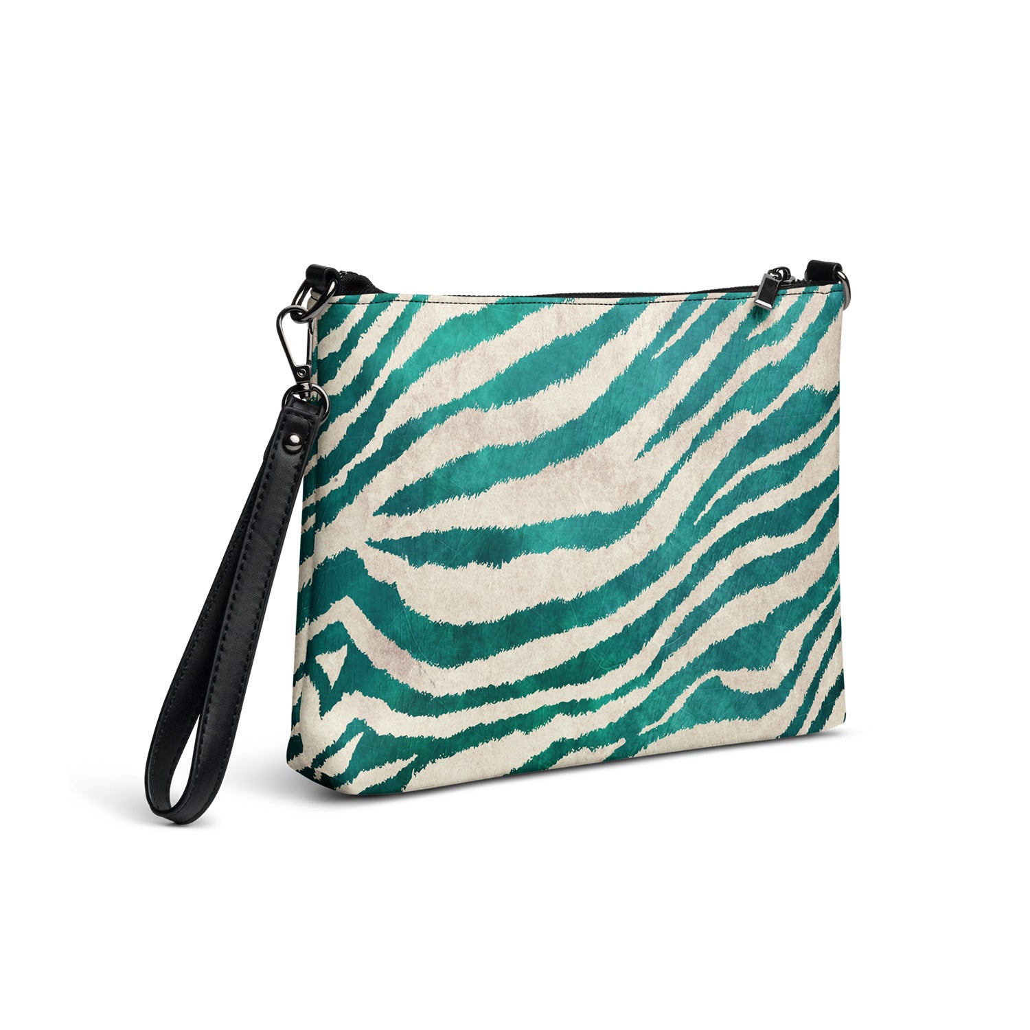 Teal and beige zebra patterned bag with a black strap on a white background