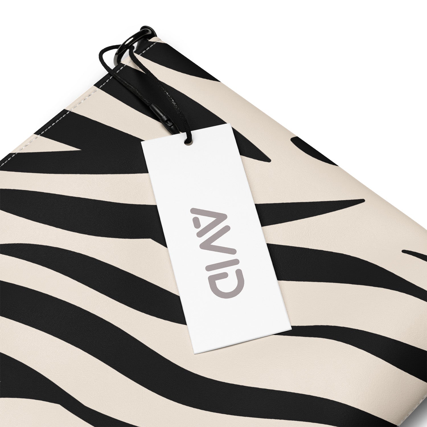 Zebra-patterned product with a white tag displaying 'AVID' on a white background