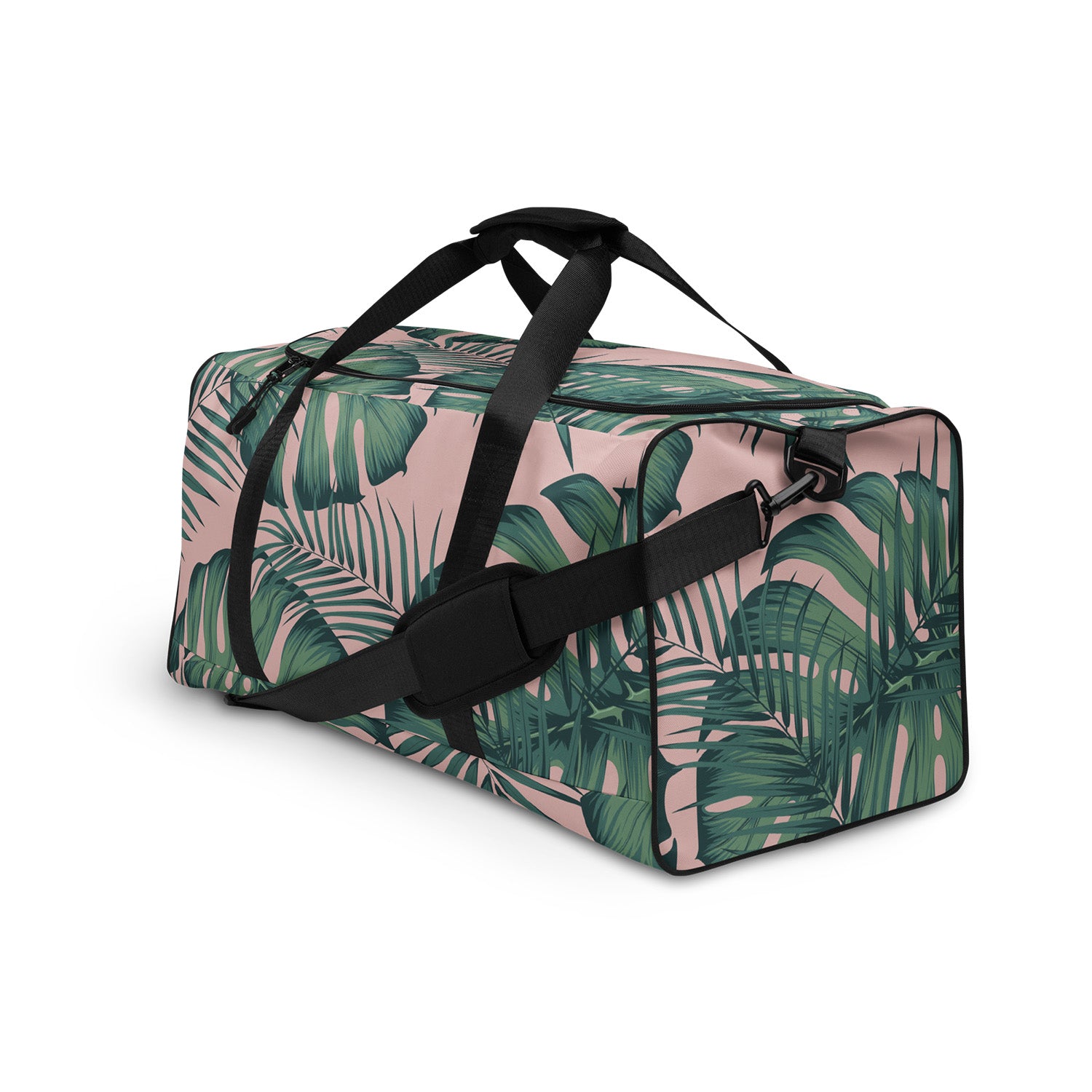 Duffel bag with tropical leaf pattern on a white background