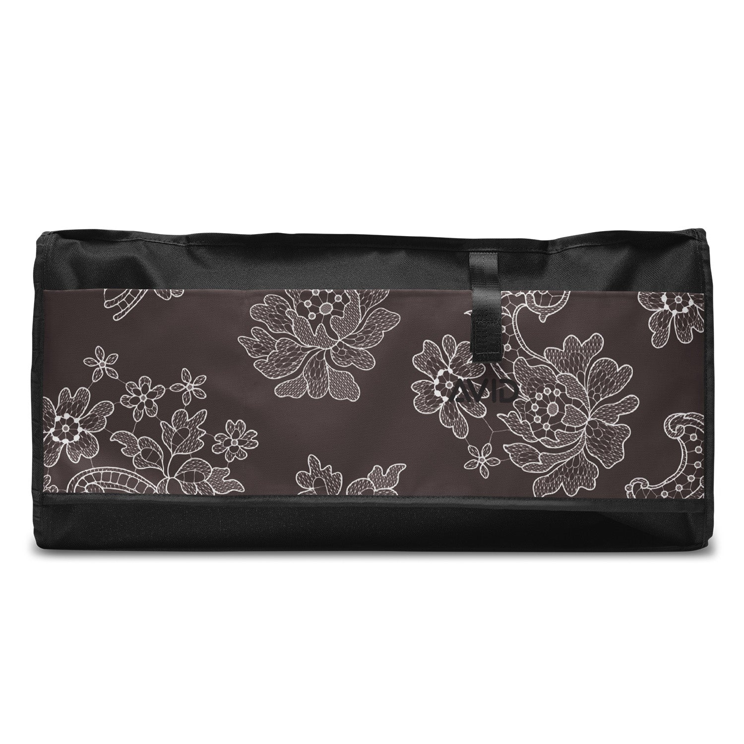 Black duffel bag with white floral patterns on a white background