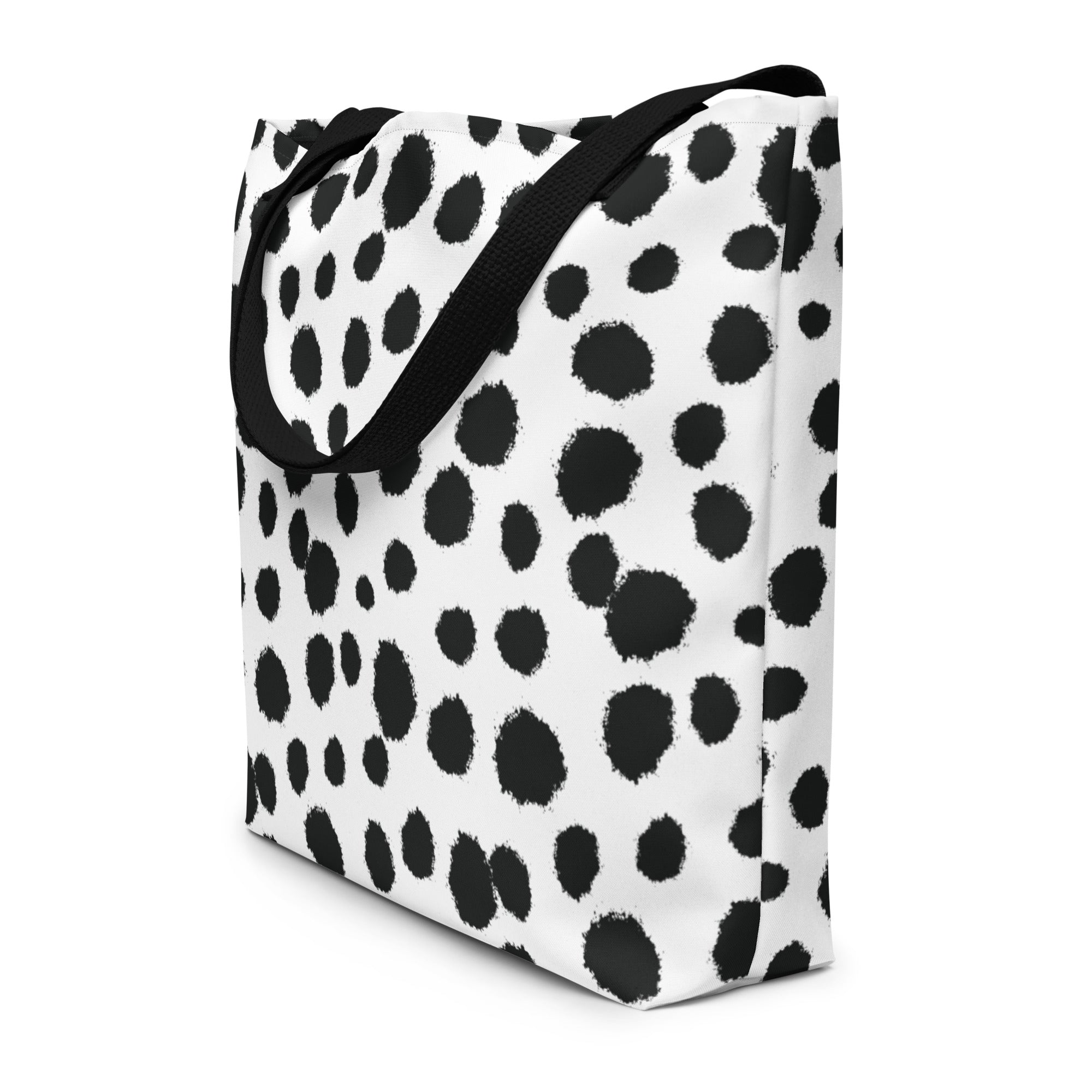 Tote bag with black polka dot pattern on a white background