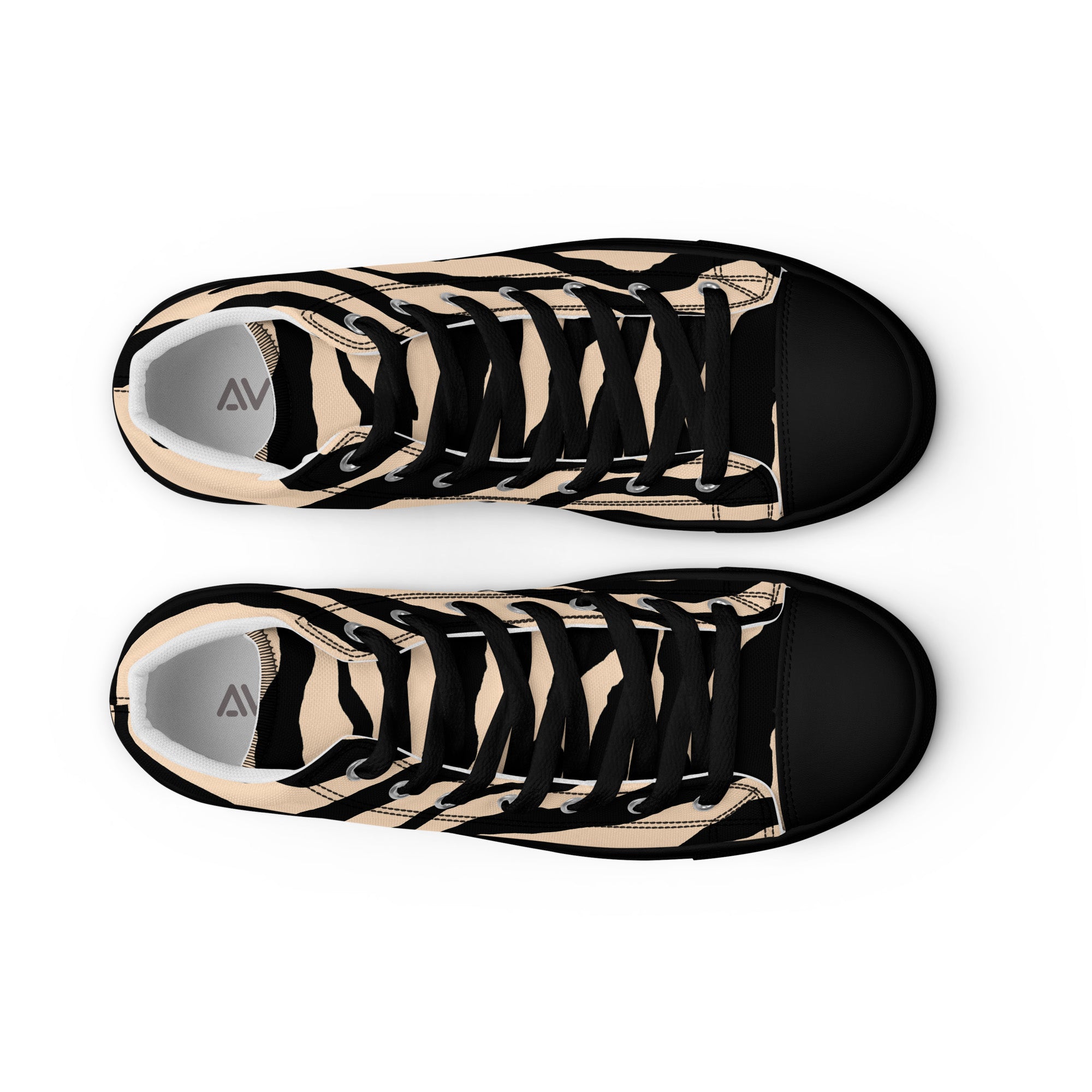 Pair of black and beige zebra-striped sneakers on a white background