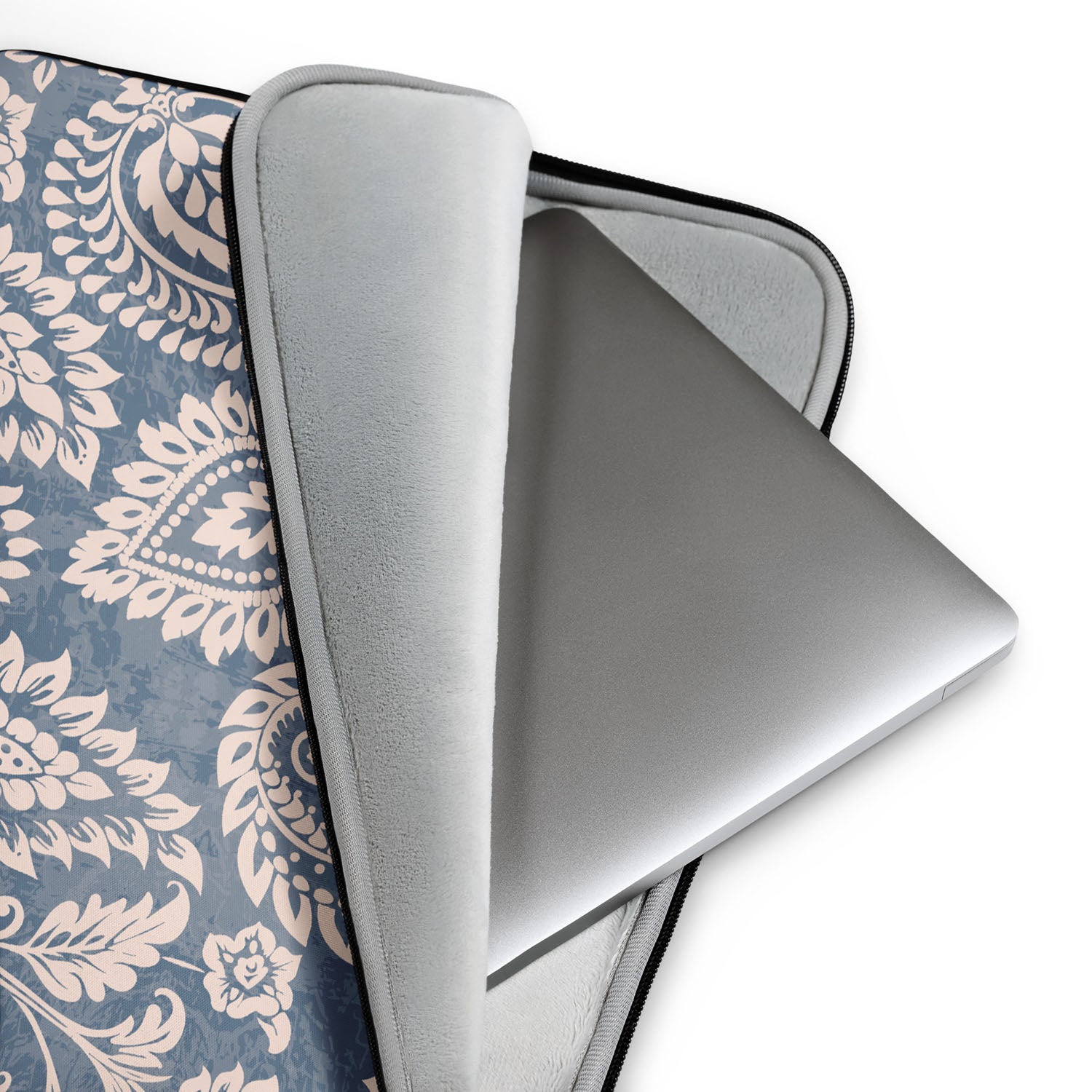 Laptop sleeve with a floral patterned sleeve on a white background
