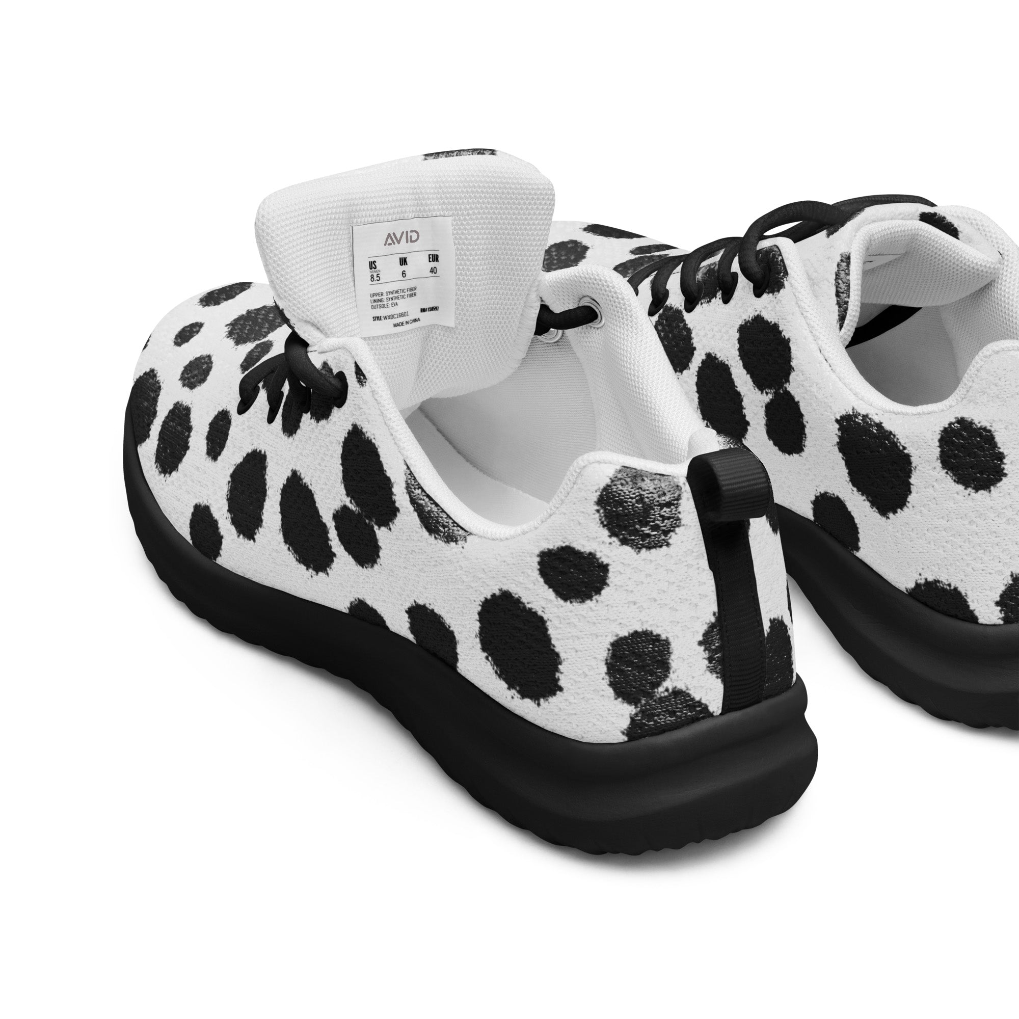 White sneakers with black polka dot pattern on a white background