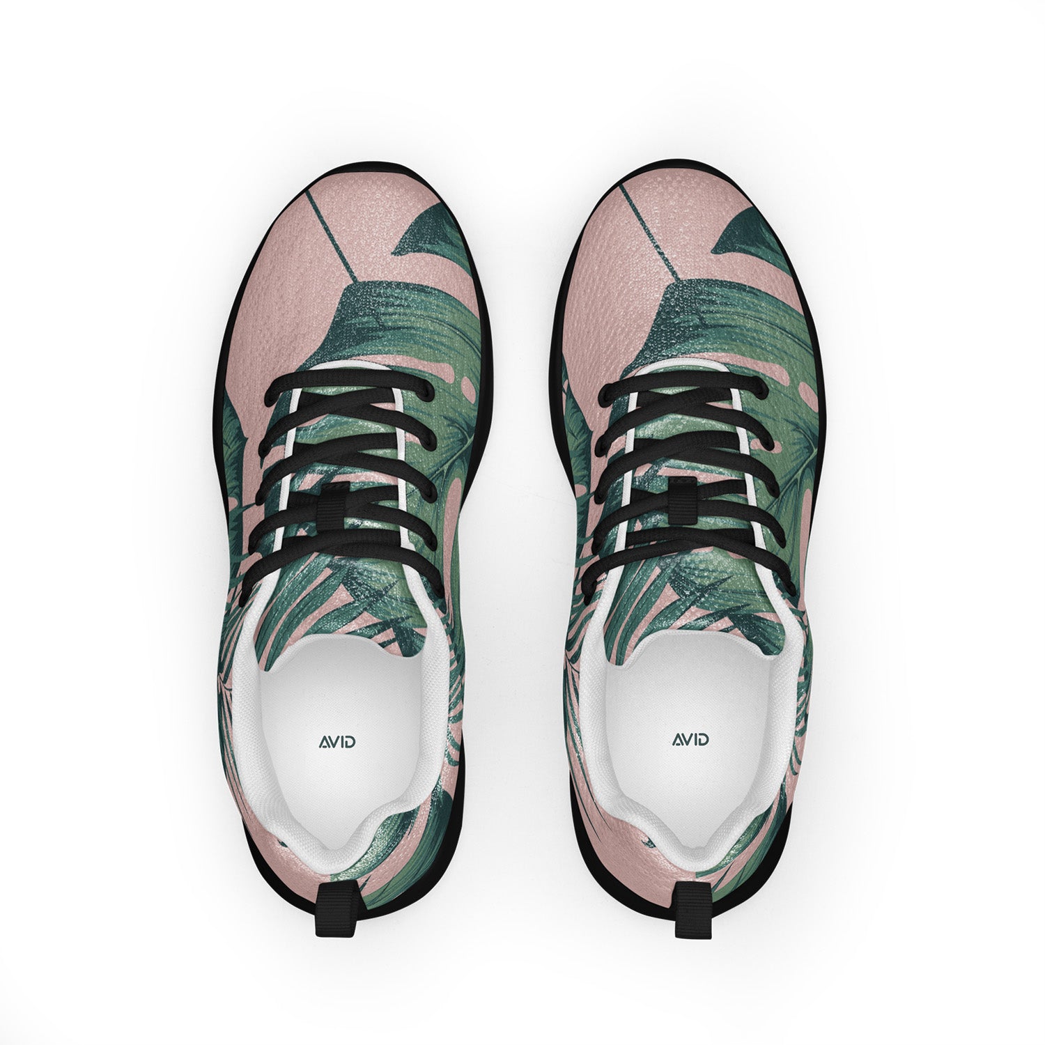 Pair of sneakers with a tropical leaf pattern on a white background