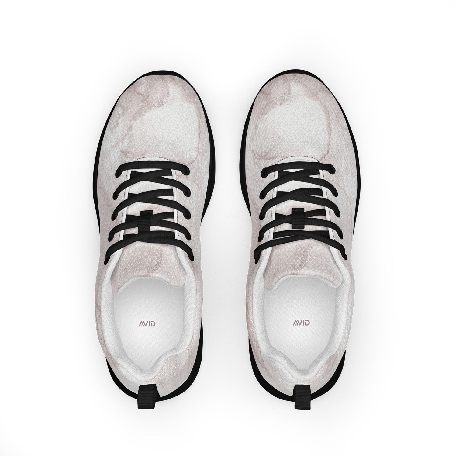 Pair of white marble pattern sneakers with black laces on a white background