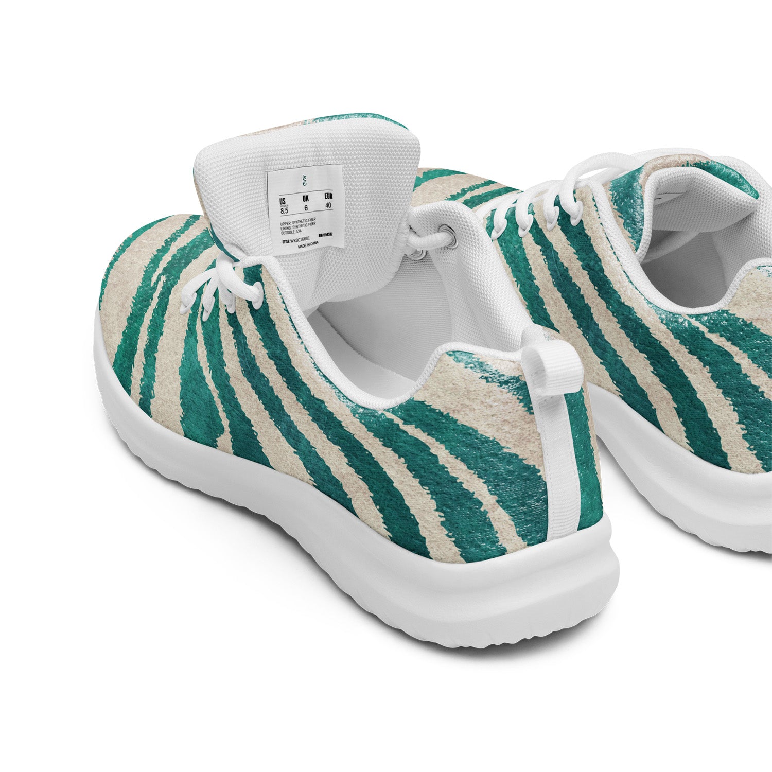 Pair of green and beige striped sneakers on a white background