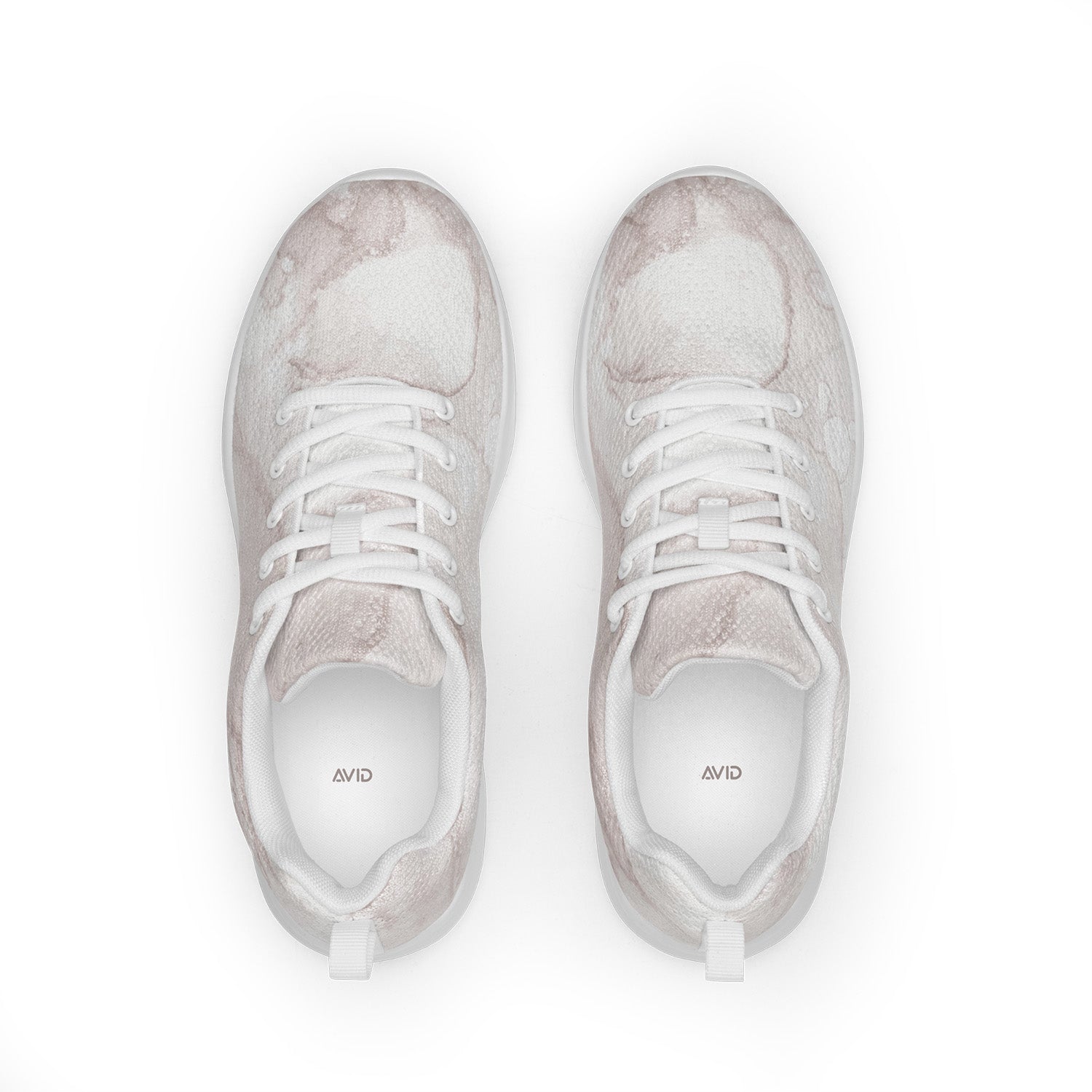 Pair of white marble pattern sneakers with white laces on a white background
