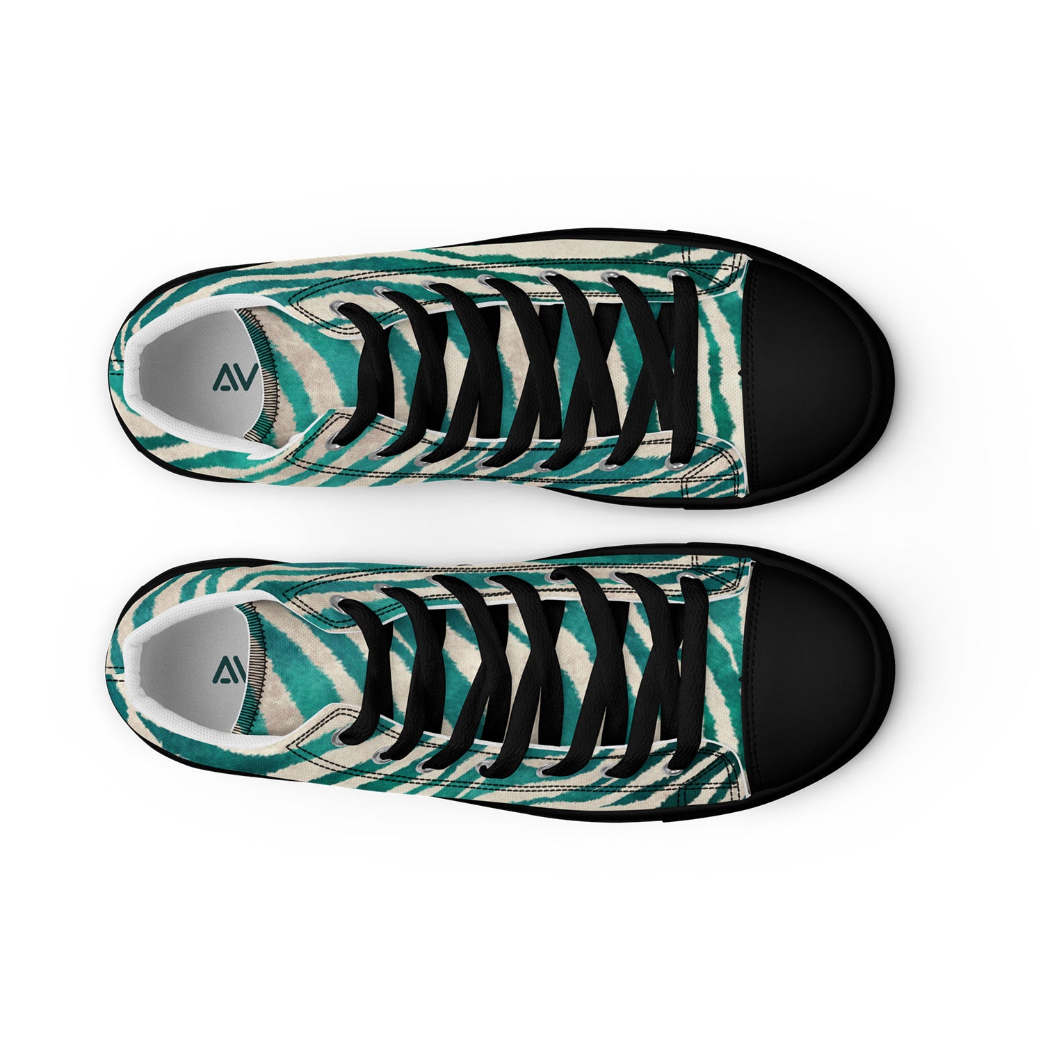 Pair of sneakers with a zebra print pattern on a white background
