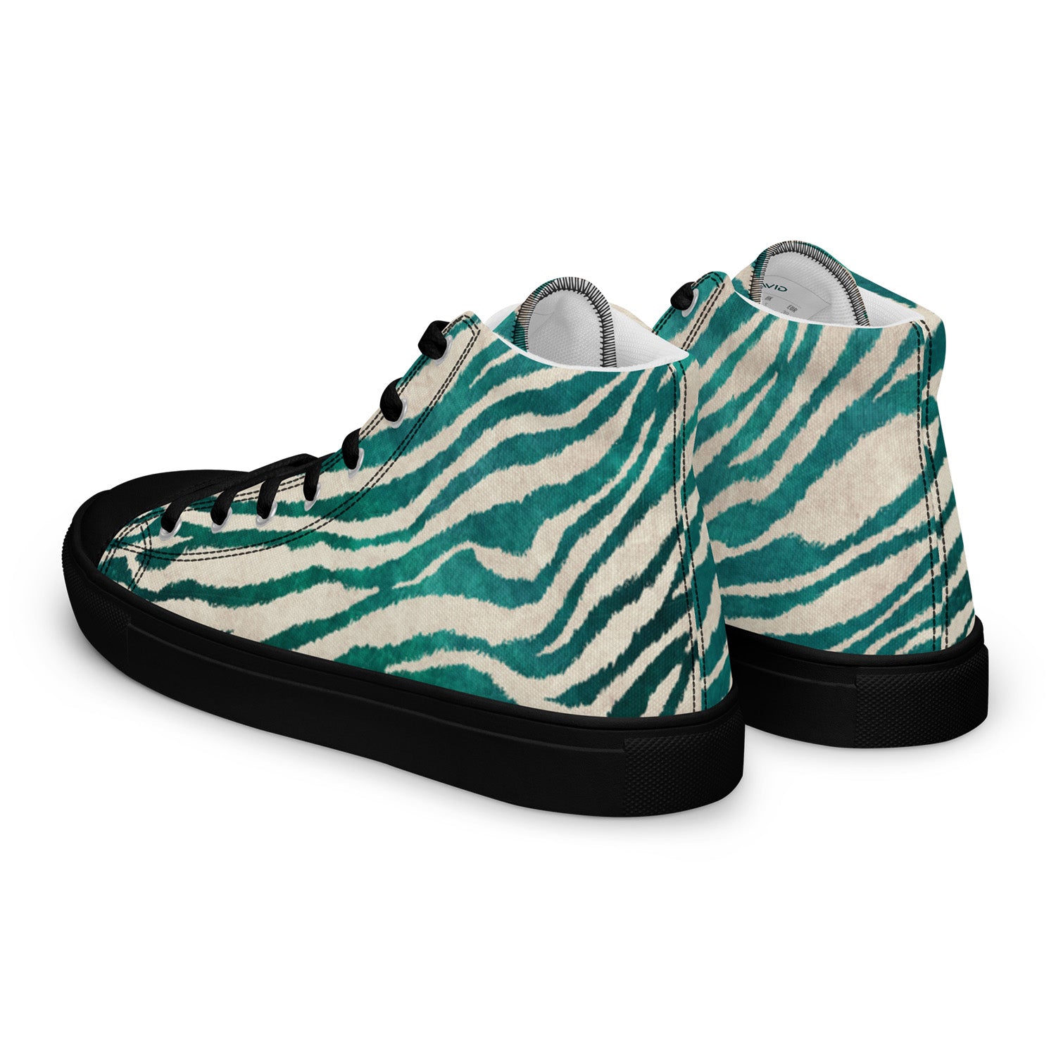 Teal and white zebra-striped sneakers on a white background