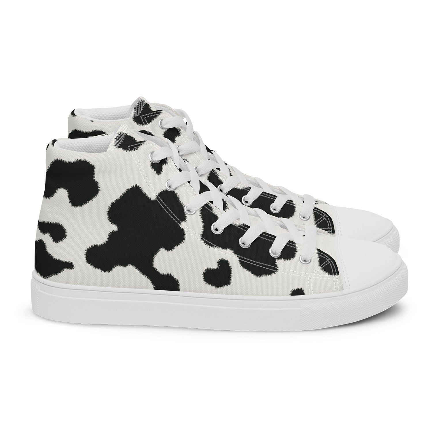 White high-top sneakers with black cow print pattern on a white background