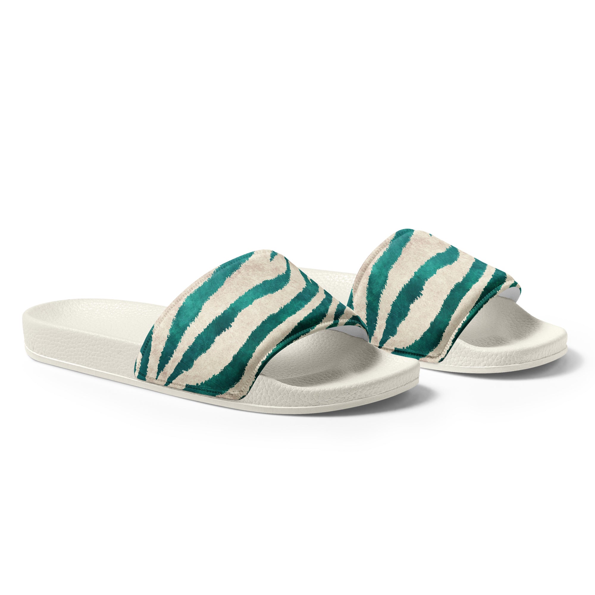 Pair of green zebra-patterned slides with white soles