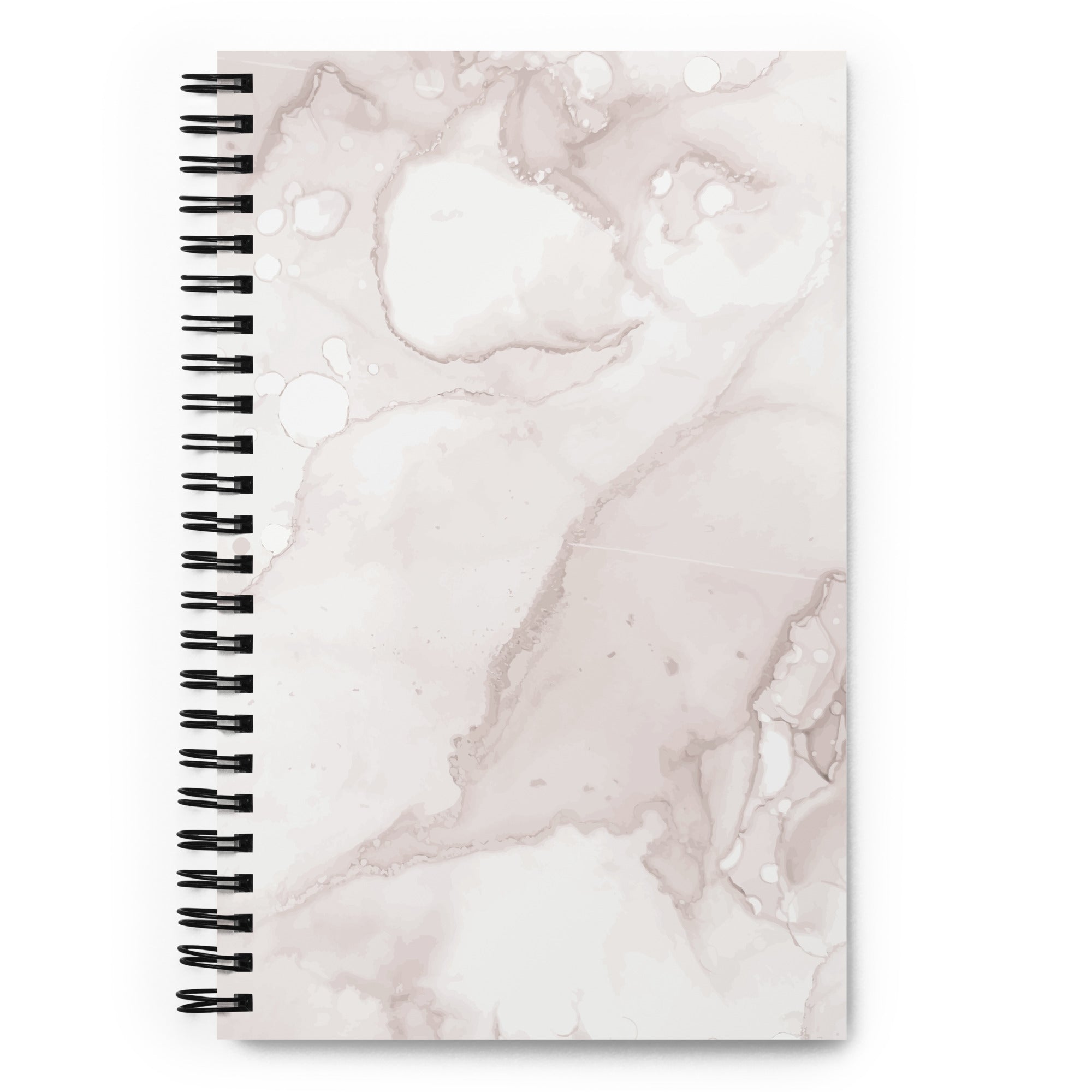 Marble-patterned notebook with a black spiral binding 