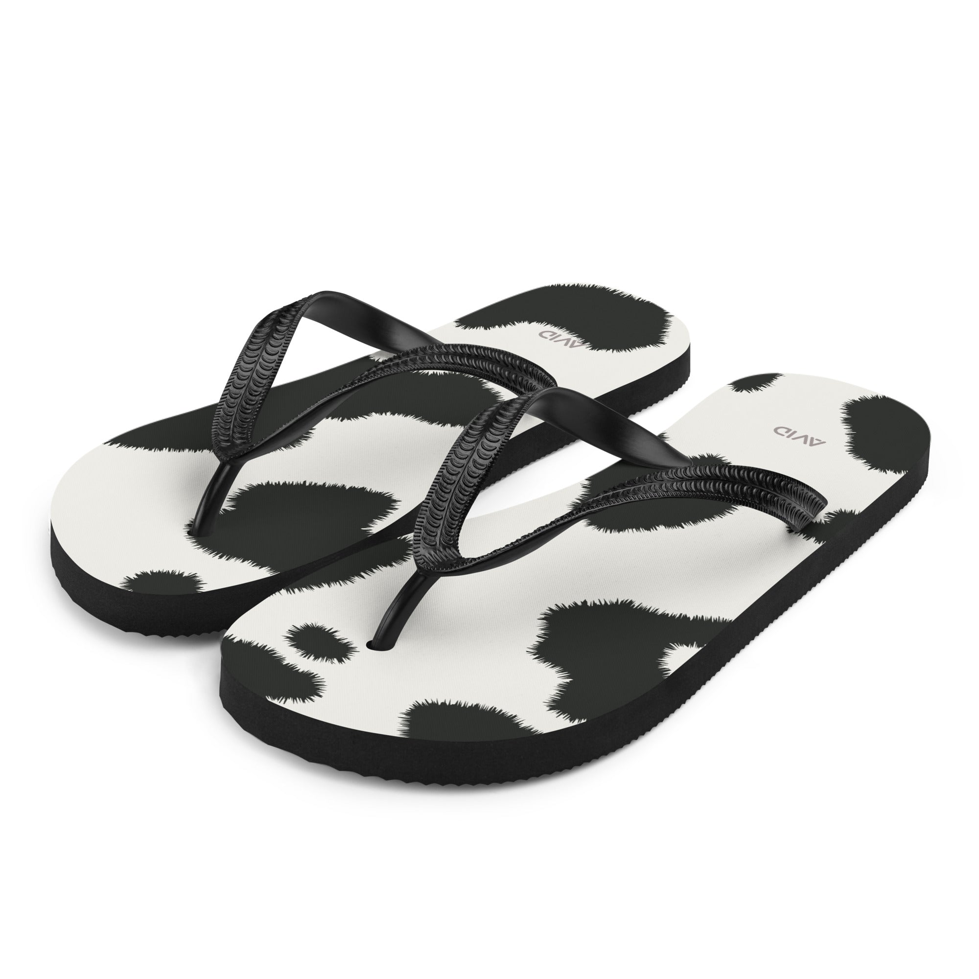 Moot cow print flip-flops