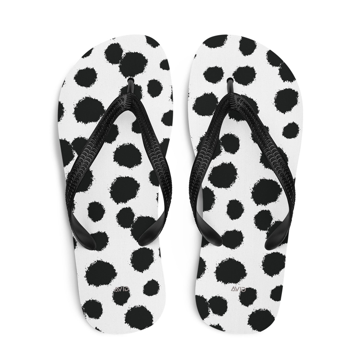Pair of black and white polka dot dalamatian flip-flops 